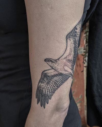 Get a unique, illustrative eagle tattoo done by Alien Ink with hand-poked dotwork style!
