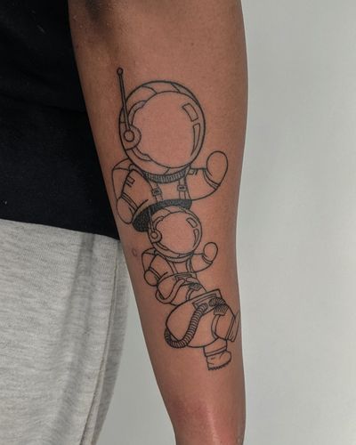 Unique dotwork and hand-poked astronaut design by Alien Ink. Dive into the cosmos with this illustrative piece.