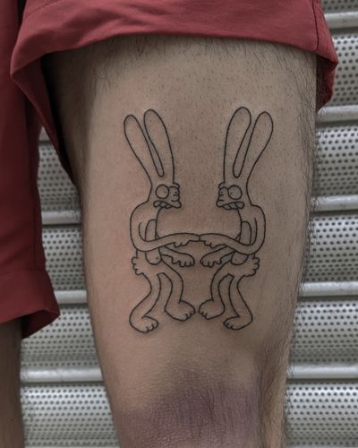 Get an edgy twist on a classic character with this fine line rabbit tattoo inspired by The Simpsons, expertly done by Alien Ink.