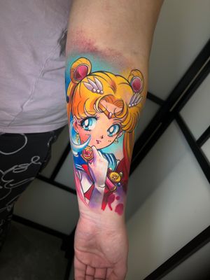 Experience magical girl power with this Sailor Moon inspired anime tattoo by talented artist Cloto.tattoos.
