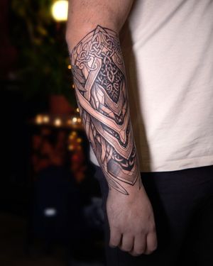 "Unlock the symbolism of Viking strength and resilience in this contemporary tattoo, a celebration of Nordic heritage in ink."
