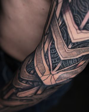 "Witness the artful revival of Viking imagery in this contemporary tattoo, a bold homage to Norse heritage."
