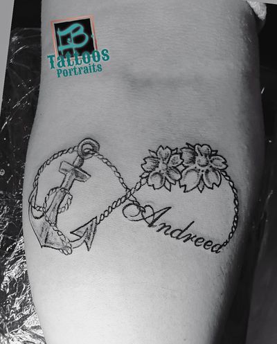 Get inked with this small lettering illustrative tattoo featuring a classic anchor and rope design by Larisa Andreea Boboc.