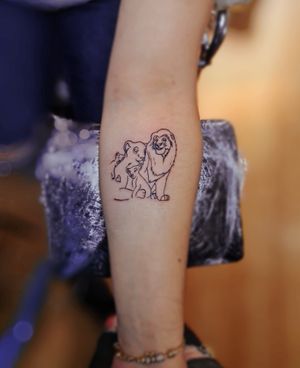 Capture the majesty of the Lion King with this intricate fine line tattoo by talented artist Larisa Andreea Boboc.