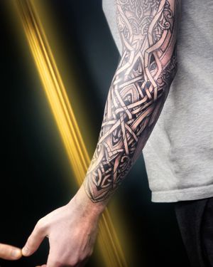 "Experience the power of neoviking artistry in this tattoo, a modern interpretation of ancient Nordic symbolism."
