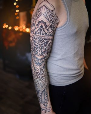 "In this contemporary tattoo, the allure of Norse heritage meets neoviking artistry, creating a visual spectacle etched in skin."
