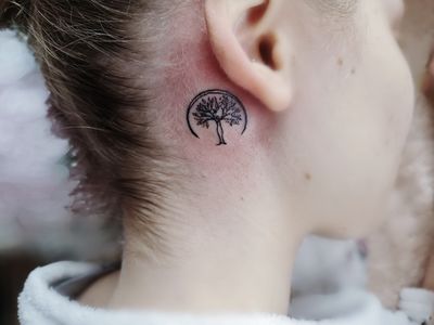 Discover the intricate beauty of this fine line illustrative tree tattoo by the talented artist Larisa Boboc. Perfect for nature lovers!