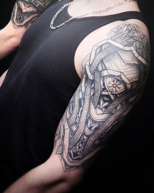 "Ink meets tradition in this contemporary Norse tattoo, where neoviking symbolism takes center stage in a bold design."
