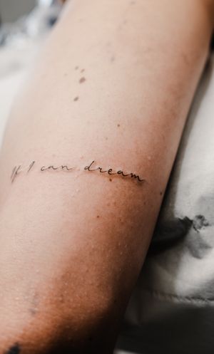 Get a delicate and intricate tattoo with small lettering done by the talented Gabriele Edu. Perfect for those looking for a minimalistic yet stylish design.