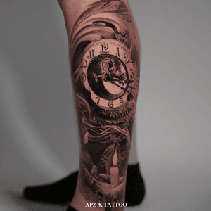 Clock Tattoo in Black and Gray Realism on Leg by APZ in Copenhagen, Denmark.In Copenhagen, APZ, a world-class tattoo artist, crafts modern black and gray realism tattoos. His clock on a leg speaks volumes with its lifelike realistic details. APZ’s talent travels from Copenhagen to New York to Dubai, leaving impactful, soulful marks wherever he goes. Want to get a unique reminder? APZ is here to help you.  Explore his portfolio on Instagram: @apztattoo.#surrealism #realism #black&gray #tattoodoambassador #blackandgray #realism #surrealism #microrealism