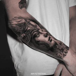 Valkyrie Tattoo in Black and Gray Realism on Forearm by APZ in Copenhagen, Denmark. In Copenhagen, APZ , a world-class tattoo artist, crafts modern black and gray realism tattoos. His Valkyrie piece on a forearm speaks volumes with its lifelike realistic details.APZ’s talent travels from Copenhagen to New York to Dubai, leaving impactful, soulful marks wherever he goes. Want to get a unique reminder? APZ is here to help you. Explore his portfolio on Instagram: @apztattoo. #surrealism #realism #black&gray #tattoodoambassador #blackandgray #realism #surrealism 