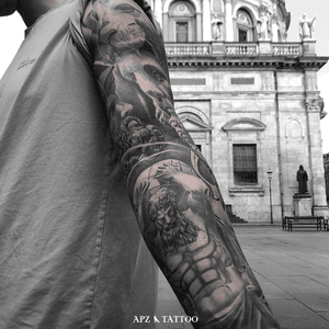 Tattoo with a Greek concept in black and gray realism on the full arm (sleeve), by APZ in Copenhagen, Denmark.In Copenhagen, APZ, a world-class tattoo artist, crafts modern black and gray realism tattoos. His Greek-statues inspired piece on an arm sleeve speaks volumes with its lifelike realistic details. APZ’s talent travels from Copenhagen to New York to Dubai, leaving impactful, soulful marks wherever he goes. Want to get a unique reminder?  APZ is here to help you.  Explore his portfolio on Instagram: @apztattoo.#surrealism #realism #black&gray #tattoodoambassador #blackandgray #realism #surrealism #microrealism