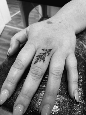 Embrace the beauty of nature with this exquisite illustrative branch tattoo. Created with precision and skill by tattoo artist Laurel.
