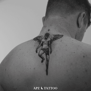 Realistic Angel Back Tattoo in Black and Gray by APZ in Copenhagen, Denmark.In Copenhagen, APZ, a world-class tattoo artist, crafts modern black and gray realism portraits. His Angel piece on a bicep speaks volumes with its lifelike realistic details. APZ’s talent travels from Copenhagen to New York to Dubai, leaving impactful, soulful marks wherever he goes. Want to get a unique reminder? APZ is here to help you.  Explore his portfolio on Instagram: @apztattoo.#surrealism #realism #black&gray #tattoodoambassador #blackandgray #realism #surrealism #microrealism