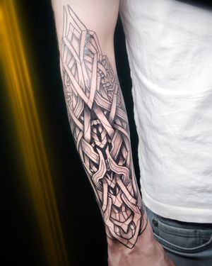 "Immerse yourself in the neo-Nordic charm of this tattoo, a fusion of traditional artistry and contemporary aesthetics."
