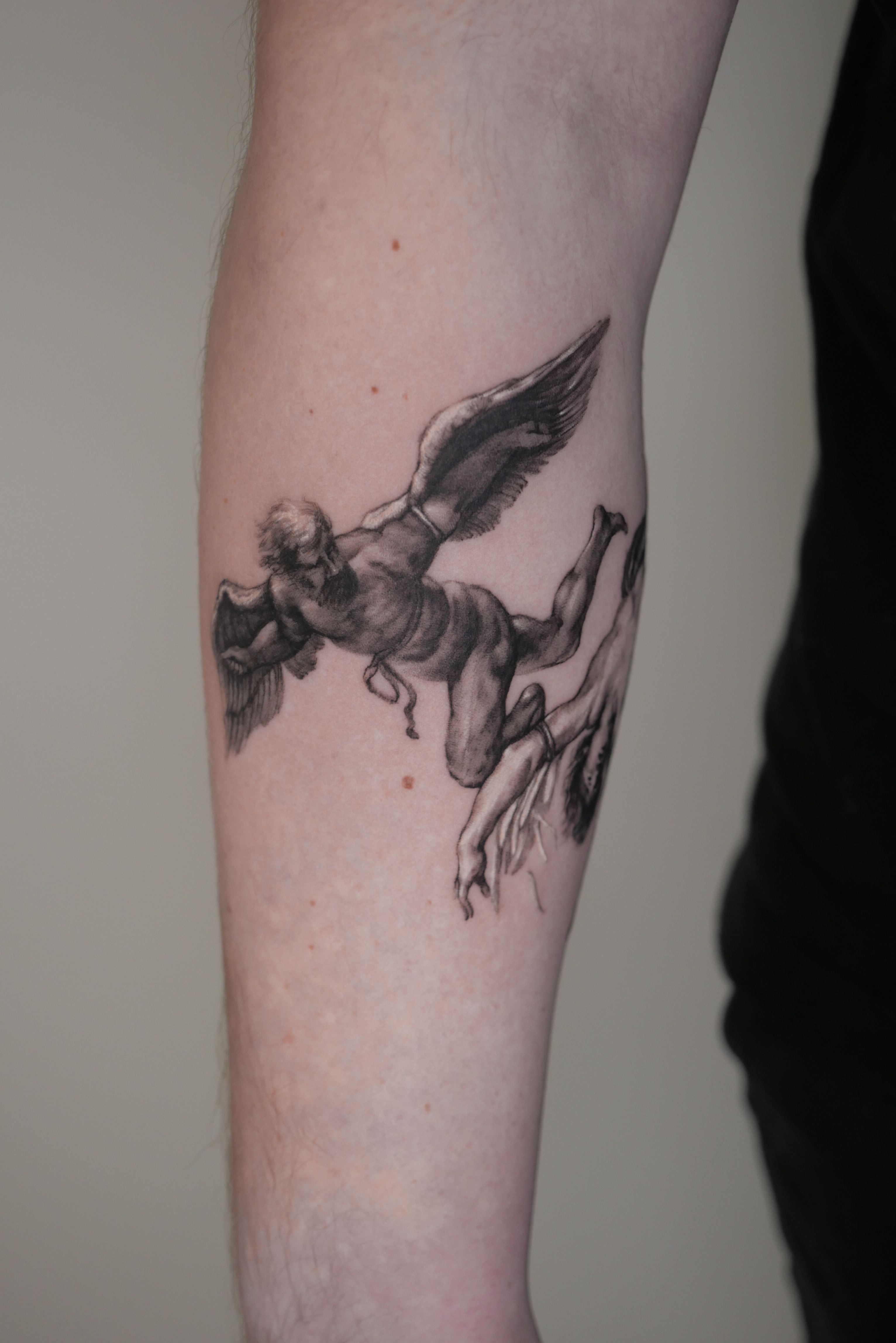 I'm not a fan of my Icarus tattoo. how would i improve it? : r/tattooadvice