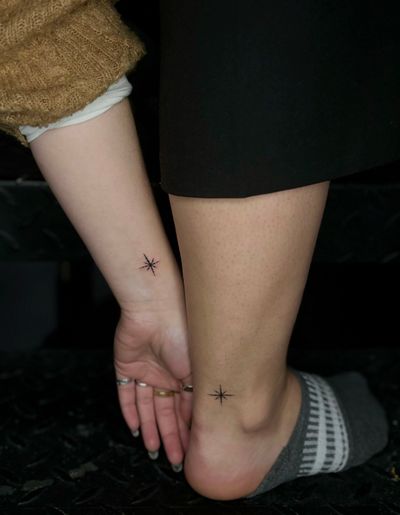 matching star and snowflake fine line tattoo