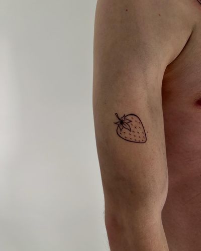 Elegant fine-line illustrative design of a strawberry, perfect for those who love minimalistic tattoos. Trust Faith Llewellyn for top-notch ink.