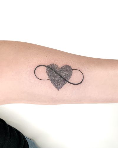 Unique illustrative design by Bradley Mollett featuring fingerprints intertwined with a heart and infinity symbol.