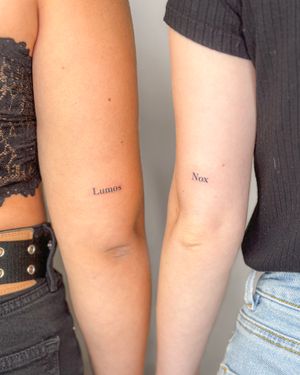 Get inked with small lettering by tattoo artist Bradley Mollett for a sleek and refined look.
