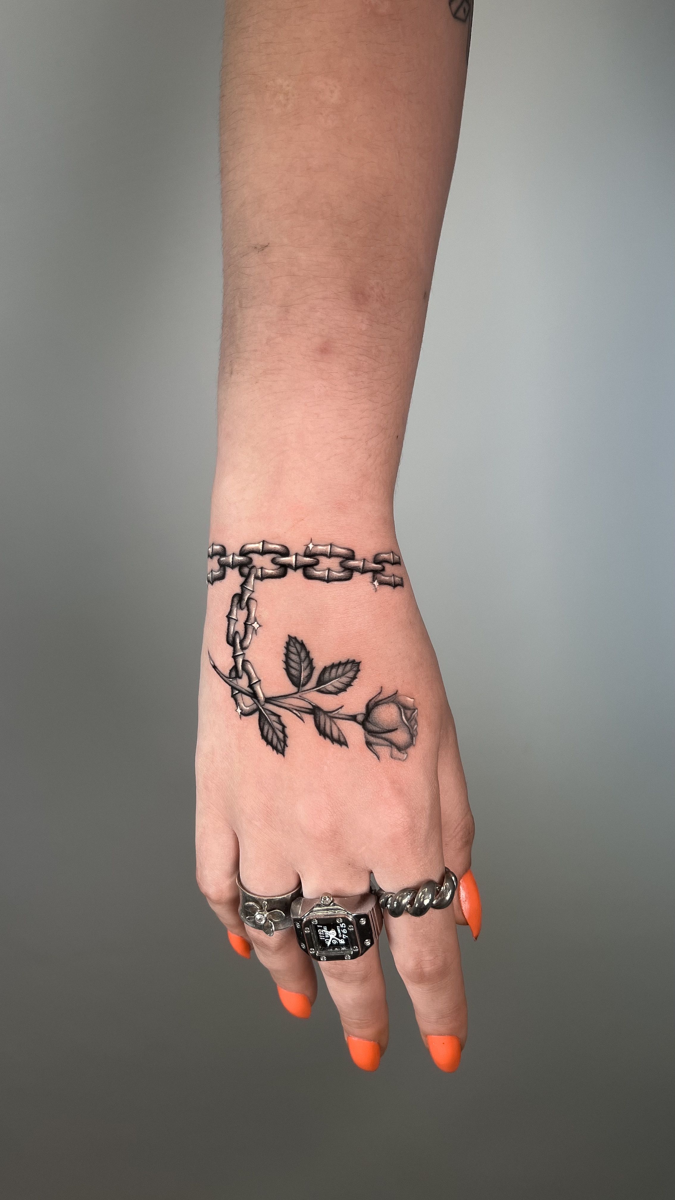 Tattoo uploaded by Katie McGowan • Black rose with gold chain on Blake •  Tattoodo