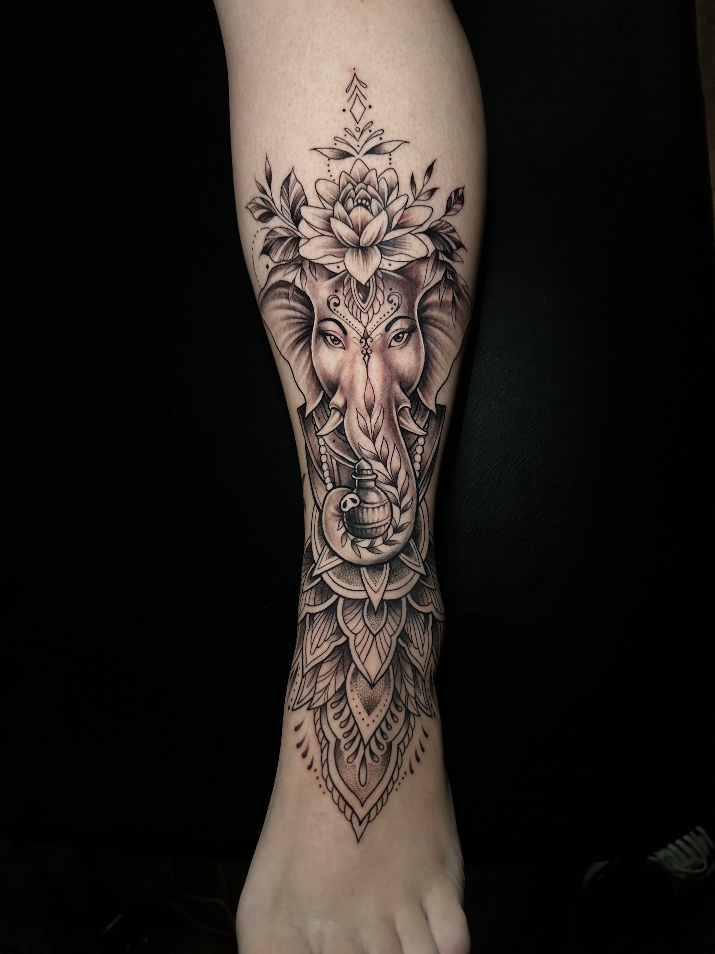 KREA - small realistic fine line art tattoo of a stylized elephant with  abstract geometric patterns, fine line tattoo, highly detailed, hd, concept