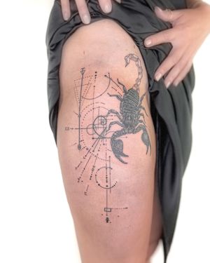 Get inked with a bold and intricate geometric scorpion design by tattoo artist Bradley Mollett. Stand out with this unique illustrative piece!