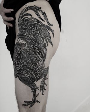 Embrace the bold and beautiful with this stunning blackwork rooster tattoo by the talented artist Lukey Wolf.