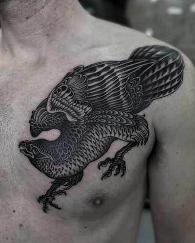 Get inked with a striking blackwork eagle tattoo by the talented artist, Lukey Wolf. This illustrative design will make you soar!