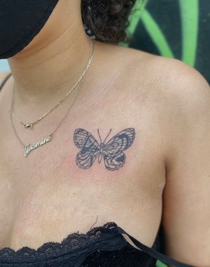 Discover the artistry of Julia Bertholdi with this stunning illustrative butterfly design. Perfect for those seeking a unique and elegant tattoo.