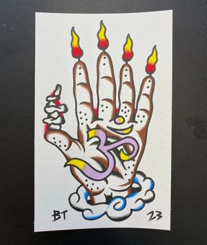 Traditional colour flash featuring a hand with a peach ohm symbol, clouds, rock formation and flames 
