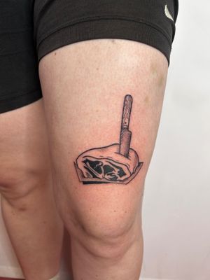 Get a striking illustrative tattoo of a knife and meat by the talented artist Jonathan Glick.