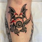 Traditional black, red and grey eyeball tattoo 