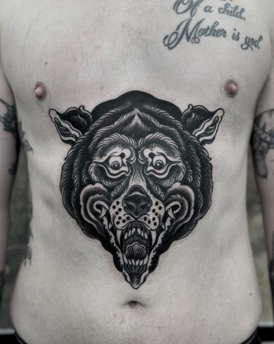 Get inked with a bold and classic bear design by the talented artist Lukey Wolf.
