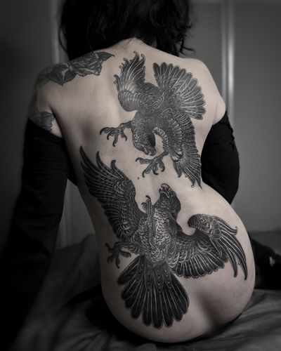 Get a stunning illustrative blackwork eagle tattoo by the talented artist Lukey Wolf. Embrace the power of nature.