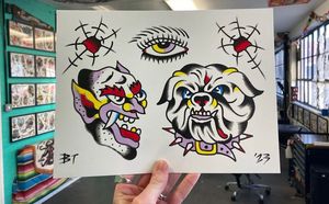 Traditional colour flash featuring a goblin head, dog head, eye and bullet holes 