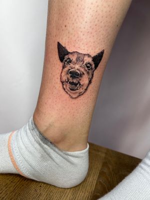 Capture the essence of your beloved pet with this exquisite illustrative dog portrait tattoo by the talented artist Jonathan Glick.