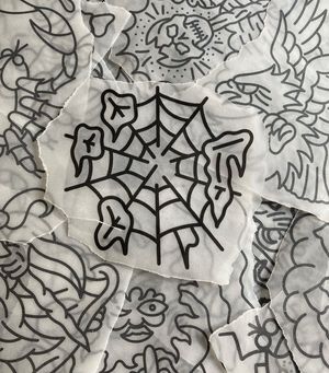 Traditional stencil flash featuring an icy cobweb 