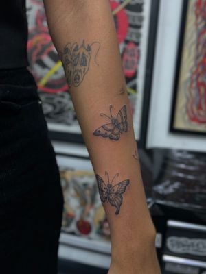 Capture the whimsical beauty of a butterfly with this stunning illustrative tattoo by renowned artist Julia Bertholdi.