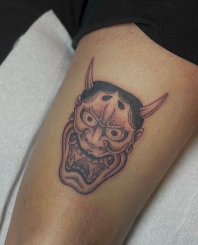 Beautiful illustrative hannya mask tattoo done by Julia Bertholdi, capturing the traditional Japanese demon with intricate details.