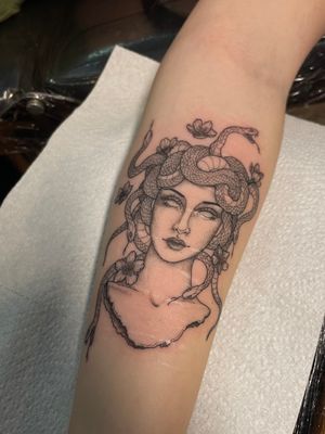Get mesmerized by the intricate dotwork style of Medusa tattoo by Julia Bertholdi, blending mythology and art.