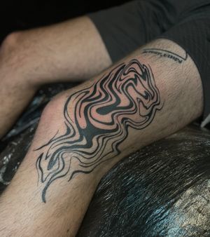 Get a unique abstract blackwork tattoo by the talented artist Julia Bertholdi. A blend of bold lines and intricate patterns for a stunning design.
