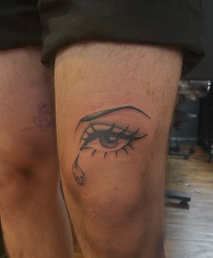 Mesmerizing eye design by tattoo artist Julia Bertholdi, blending realism with illustrative style.