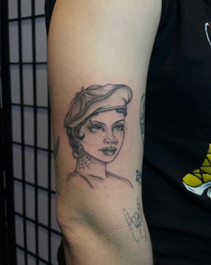 Capture the beauty of a woman with this stunning illustrative tattoo by the talented artist Julia Bertholdi.