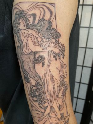 Capture the elegance of Alphonse Mucha's style with this intricate dotwork tattoo by talented artist Julia Bertholdi.
