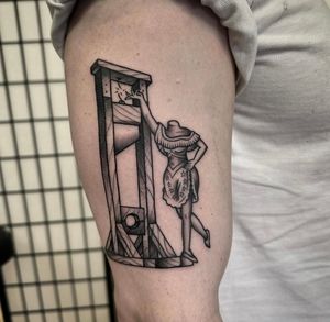 Experience the intricate details and bold lines of this illustrative guillotine tattoo, expertly crafted by renowned artist Sam Waiting.