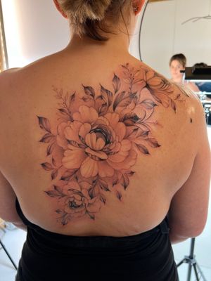 Elegant and delicate floral design featuring a beautiful flower created with precise fine line work by talented artist Ion Caraman.