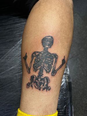 Get a bold and detailed blackwork tattoo of a skeleton by renowned artist Oliver Soames. Perfect for those who love dark and intricate designs.