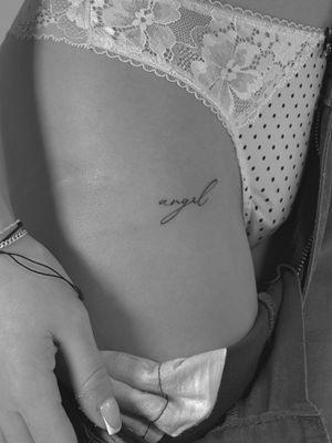 Get a delicate and intricate small lettering tattoo by Saka Tattoo for a minimalistic and classy look.