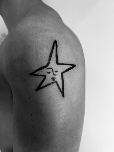 Get a striking ignorant style star tattoo created by the talented artist Oliver Soames. Stand out with this unique design!